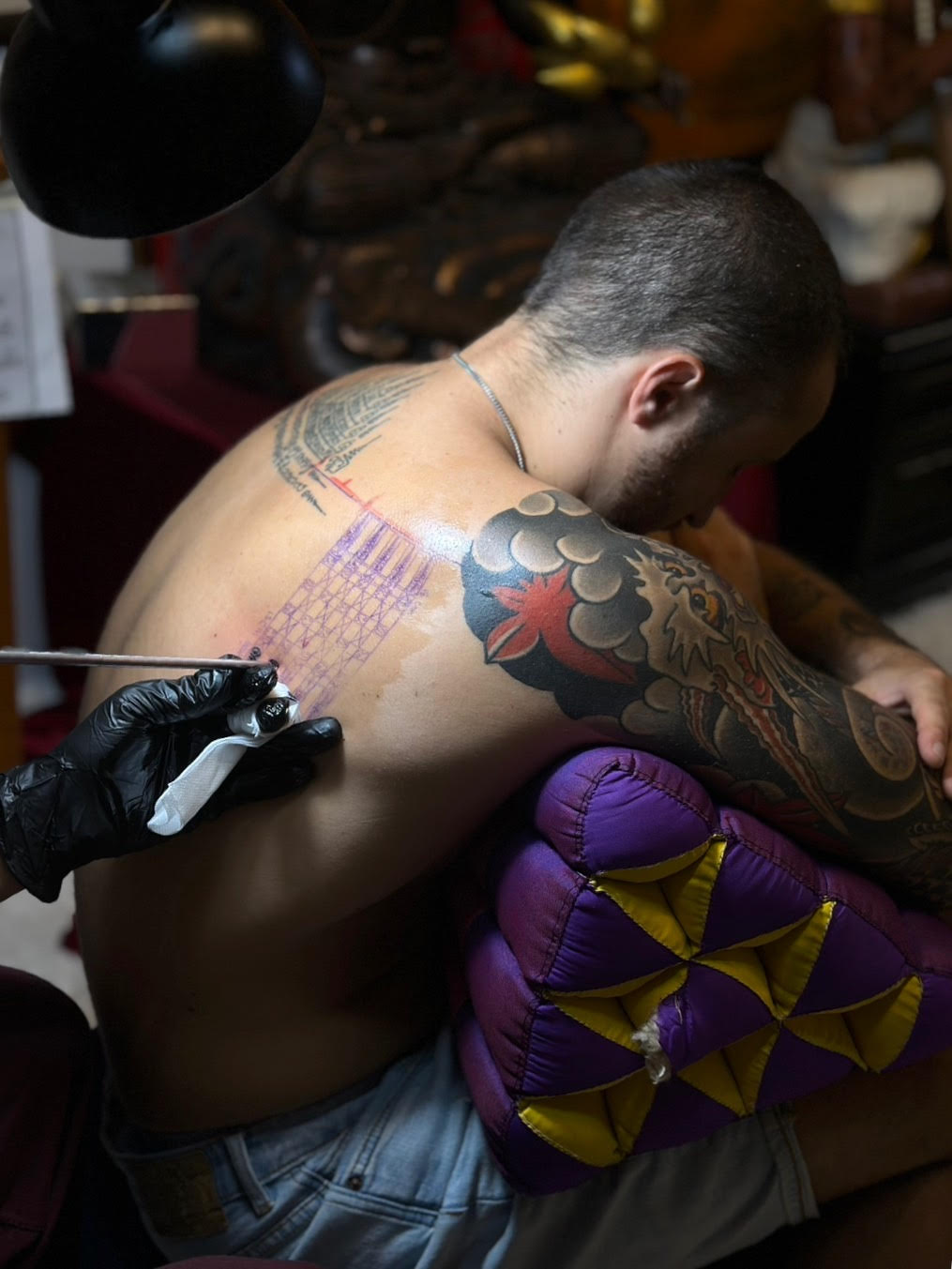 Traditional Sak Yant tattooing process